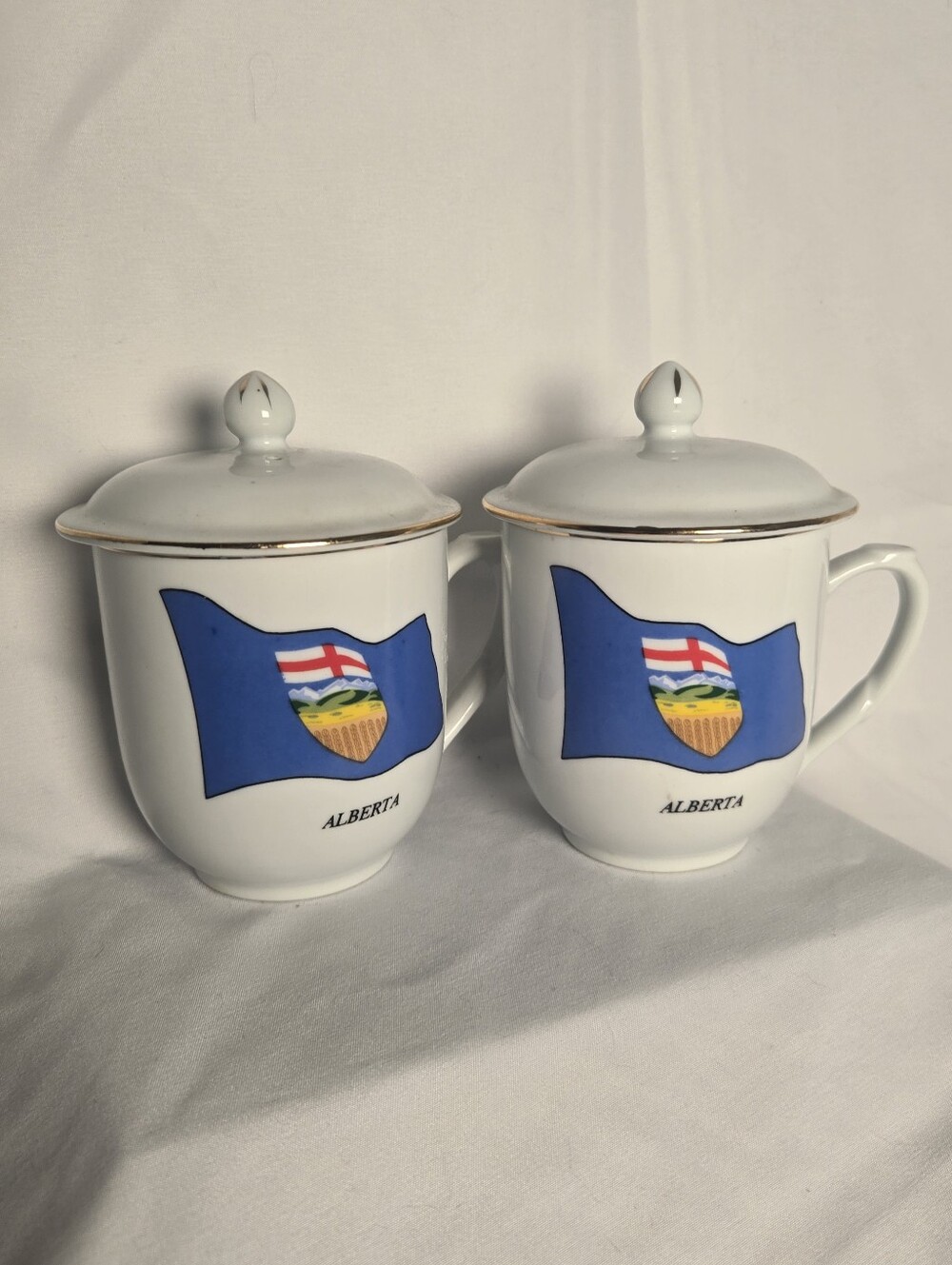 Alberta Flag Lidded Mugs Set of 2 Gold Rim Porcelain Canadian Collection